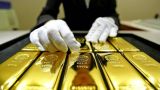Эксперт: Власти могут запретить частным лицам владеть золотом