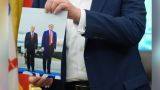 Перешел к пряникам: Трамп показал фото с Путиным и пригласил на ЧМ-2026 по футболу