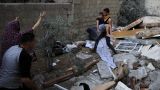 В секторе Газа 13 человек погибли при попадании израильской ракеты в жилой дом