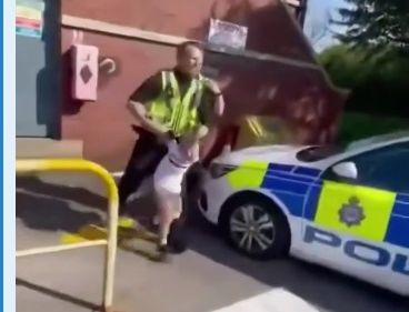 In Britain, police using force detained a crying 5-year-old boy